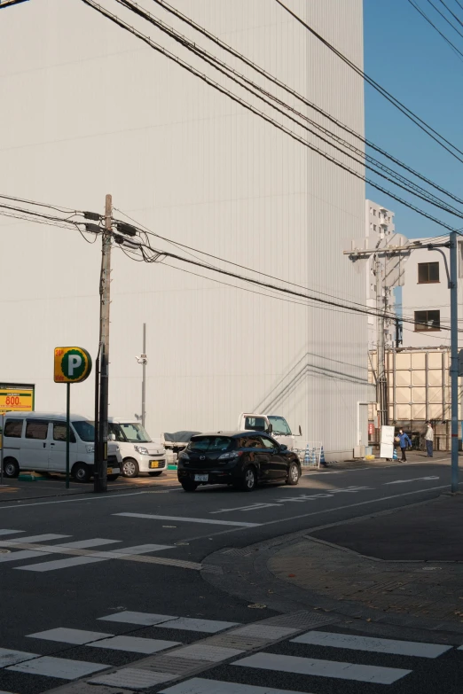 an intersection with a street sign that reads 7 35