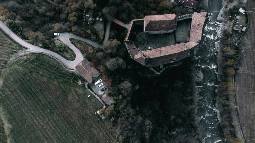 an aerial view of a very old style house