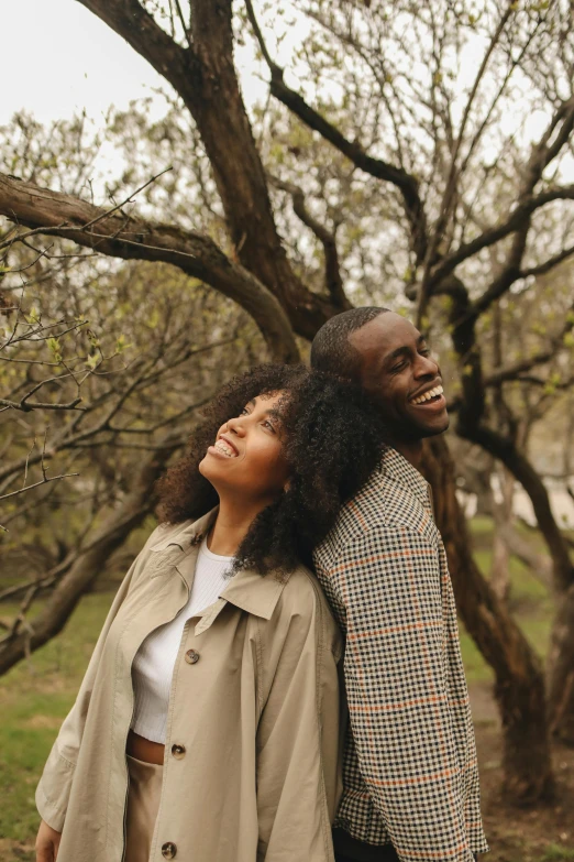 young couple enjoying their first autumn trip together