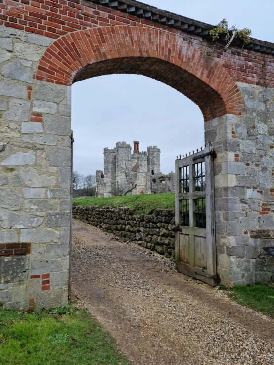 a view of a gate that leads to a castle