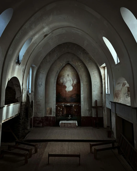 a church filled with lots of pews and benches