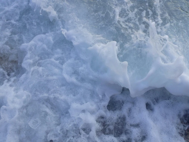 the water is breaking into large chunks of rocks