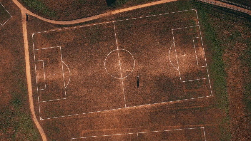 an aerial view of a soccer field that looks like it is made out of grass