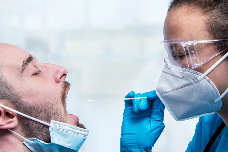 two men wearing masks and protective equipment with sys on their faces