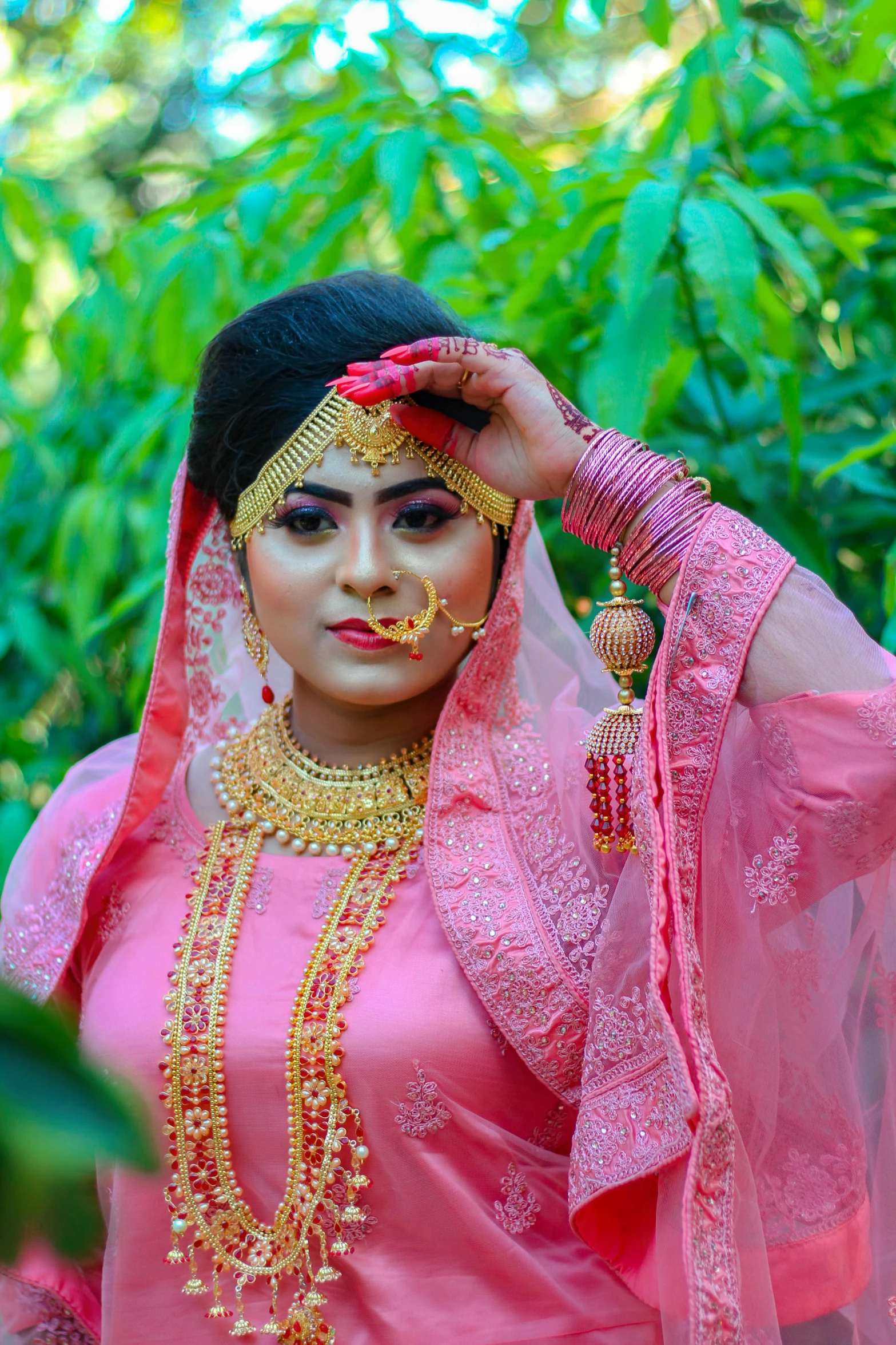 the woman is in traditional clothing for her wedding