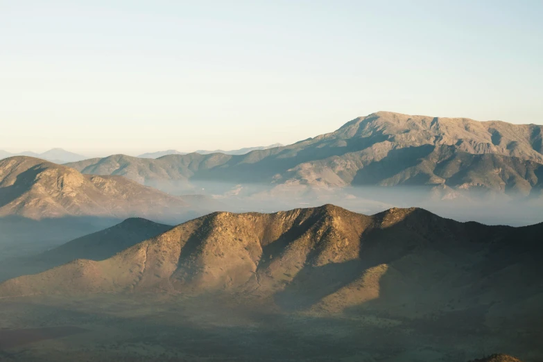 there is a very tall mountain on the horizon