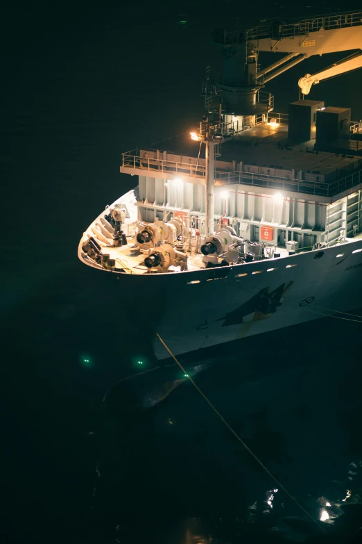 an aerial view of a large ship in the ocean