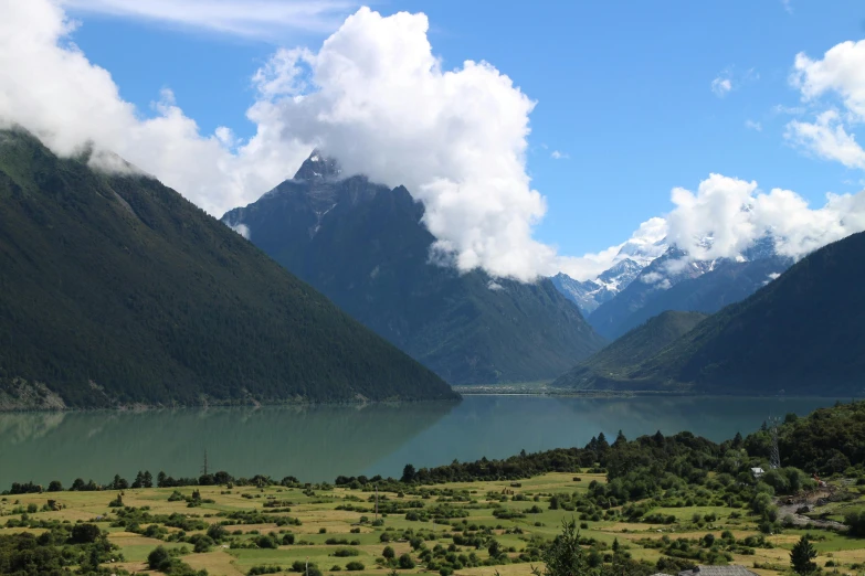 a view of some mountains and water that looks like a valley