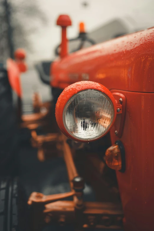 a close up s of the front light of an old tractor