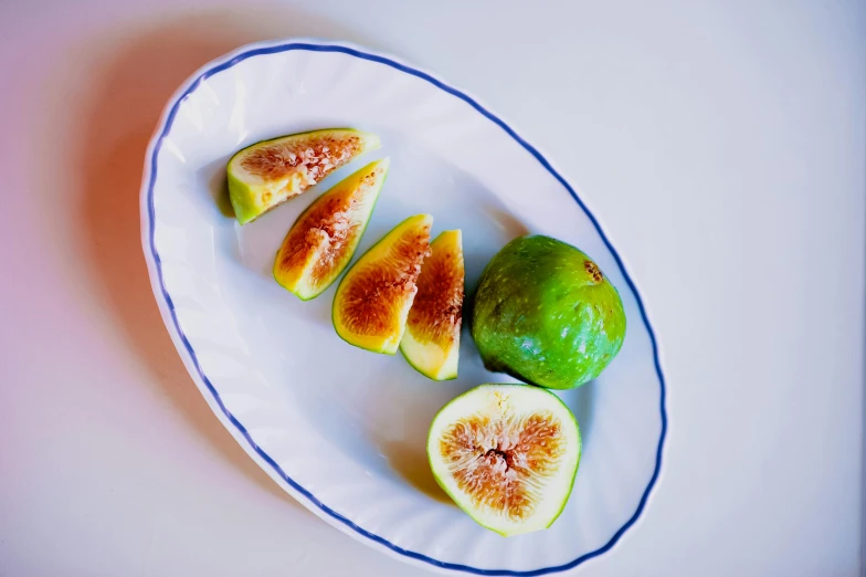 three figurines cut into slices on a plate