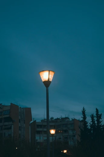 a street lamp on top of a metal pole