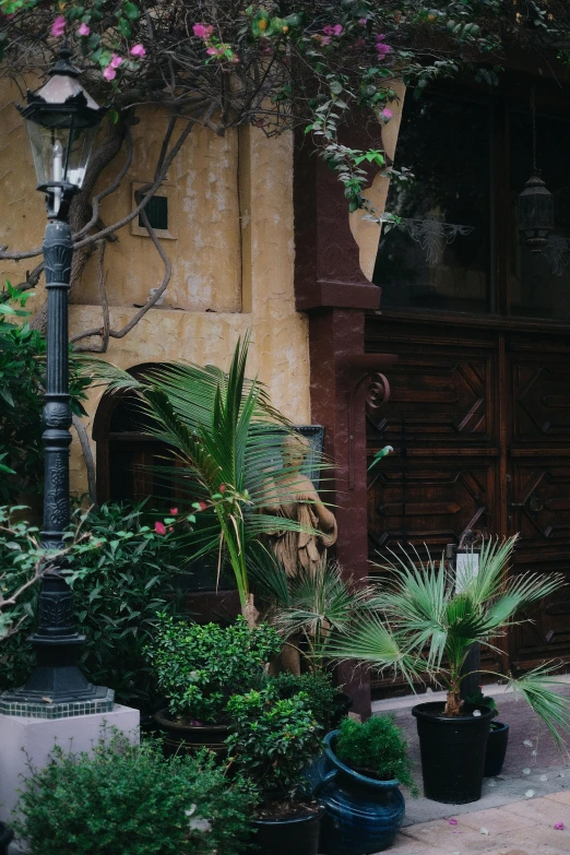 a lamppost sitting in front of a building