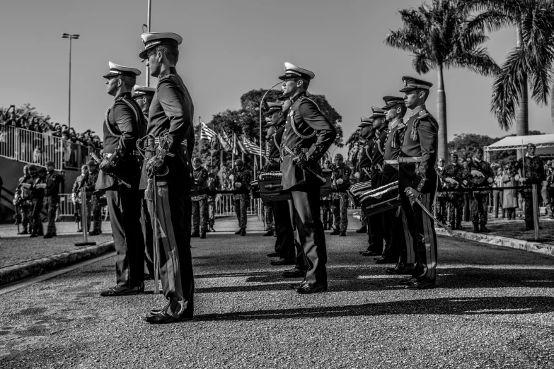 soldiers lined up on a parade in uniform