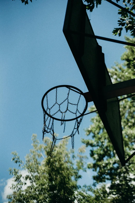 a basketball hoop with chain link lines hanging