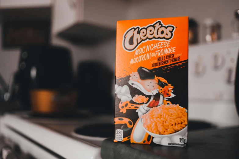 a cereal bar with a small orange package