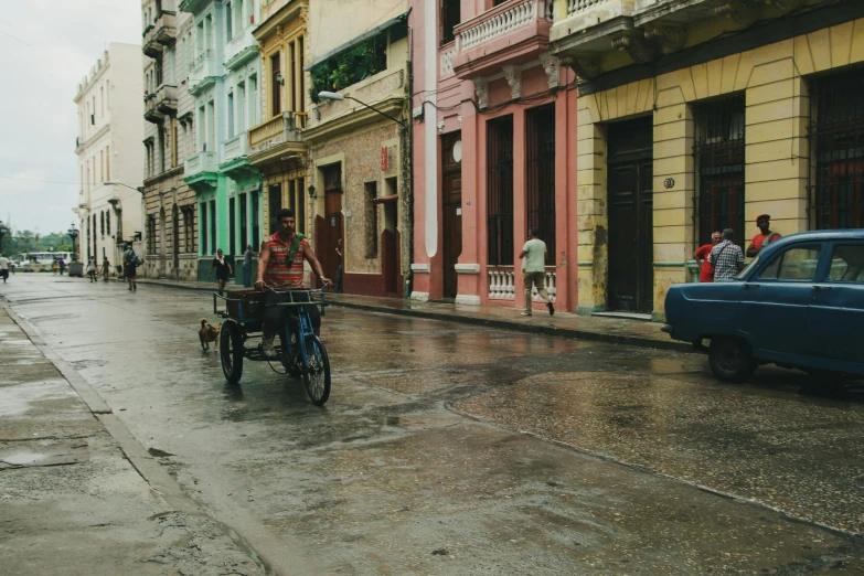 the old fashion covered cart is on a rainy street