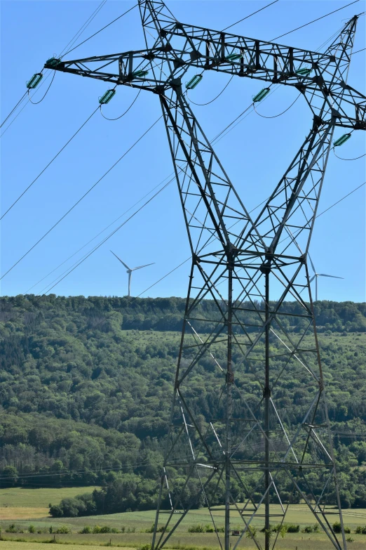 a large metal tower is shown on the plains