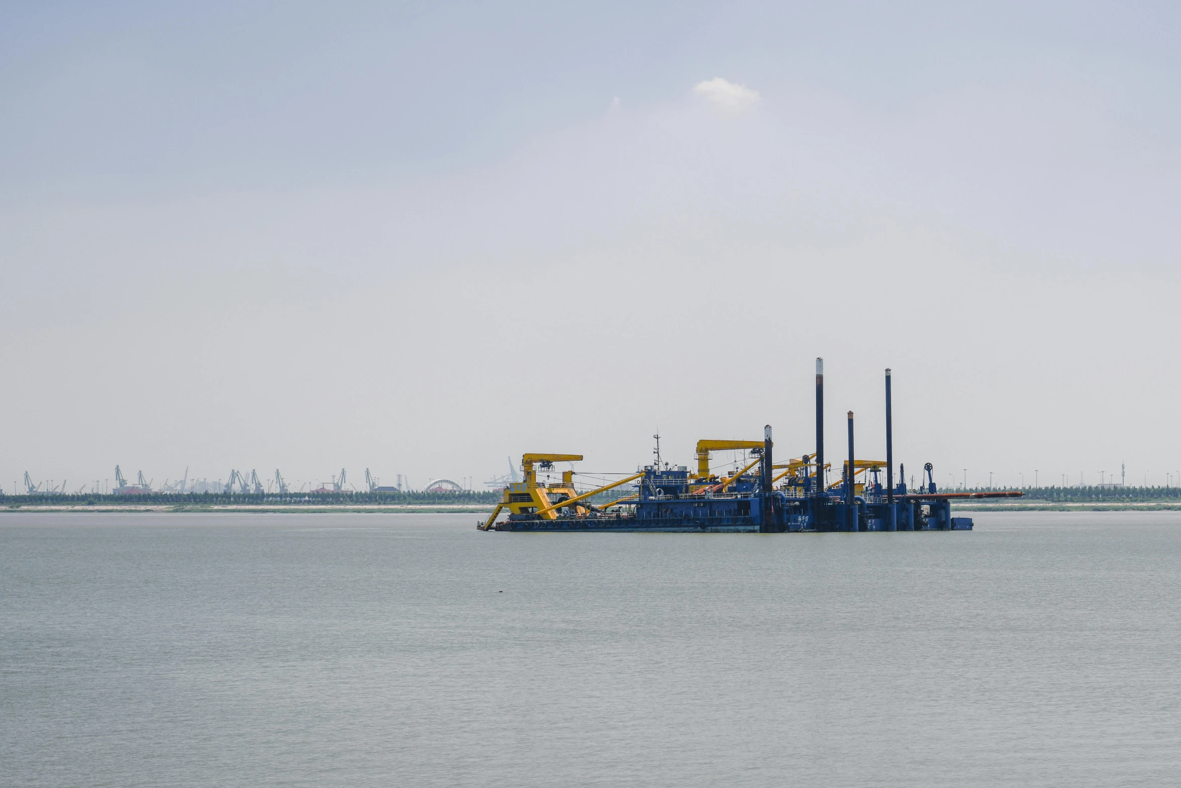 a large body of water near a small ship