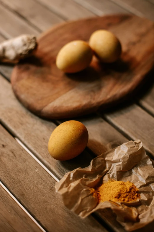 some food sitting on top of a wooden  board