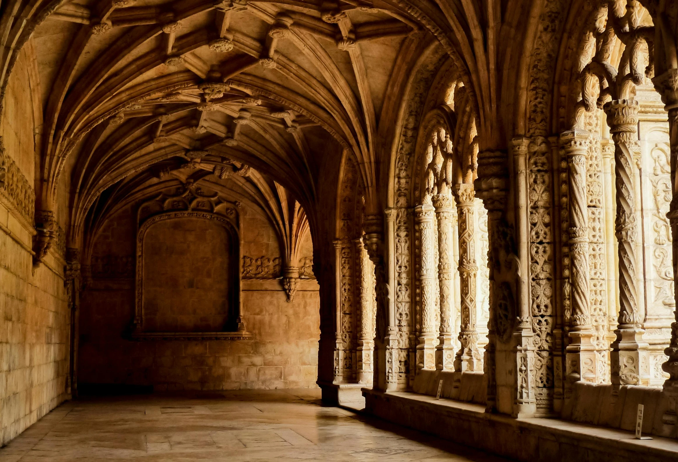 a beautiful old building with columns and arches