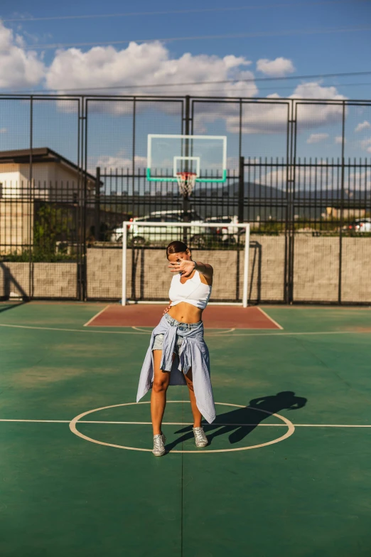 two women emcing on the basketball court