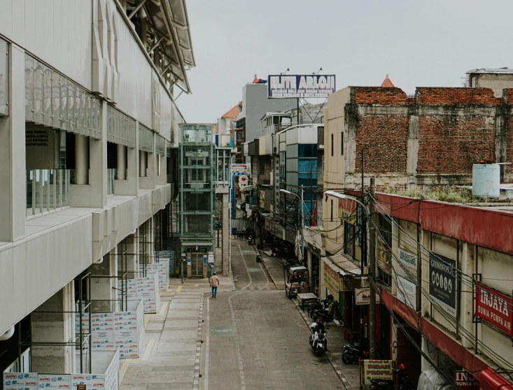 street view looking down a long street lined with buildings