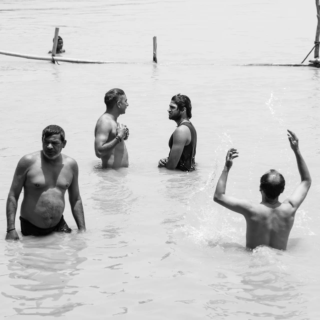 people in the water at a competition swimming