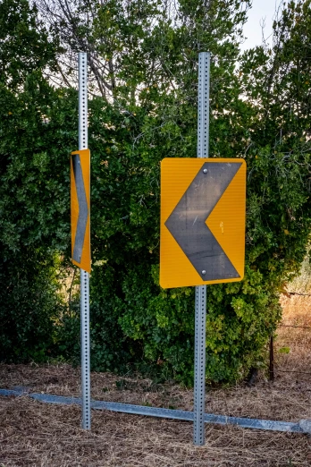the signs indicate directions to the next road