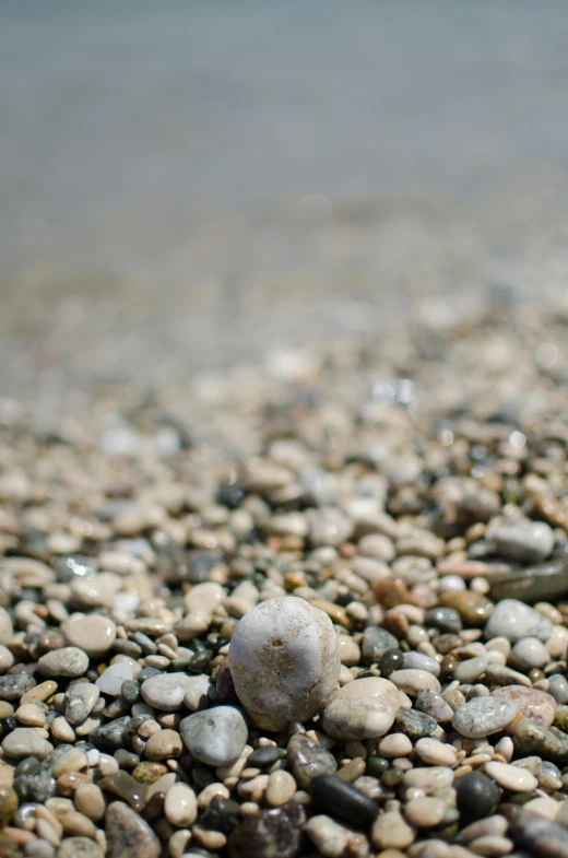 small rocks sitting on the ground, some kind of rocks