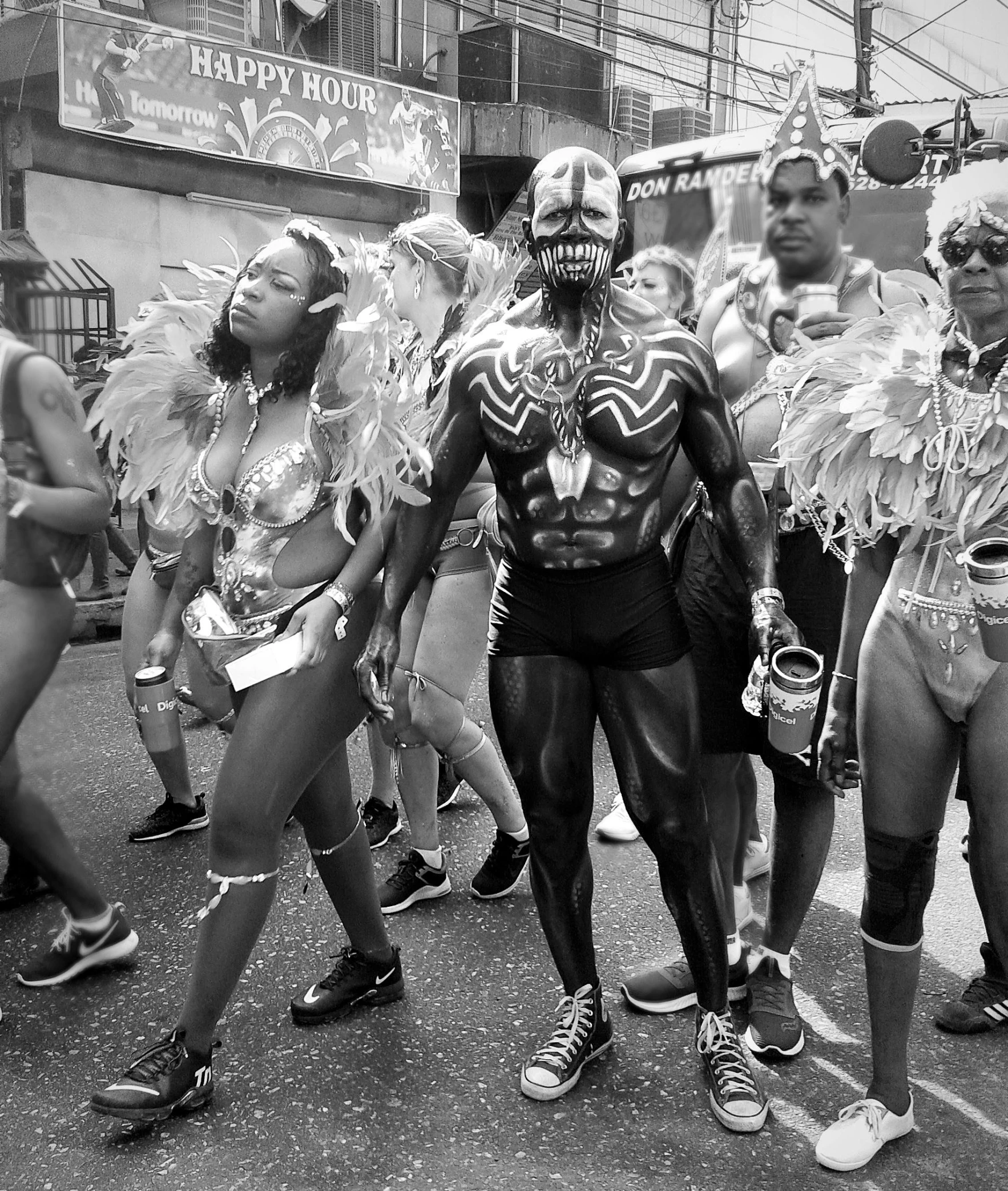 some people wearing costumes standing in the street