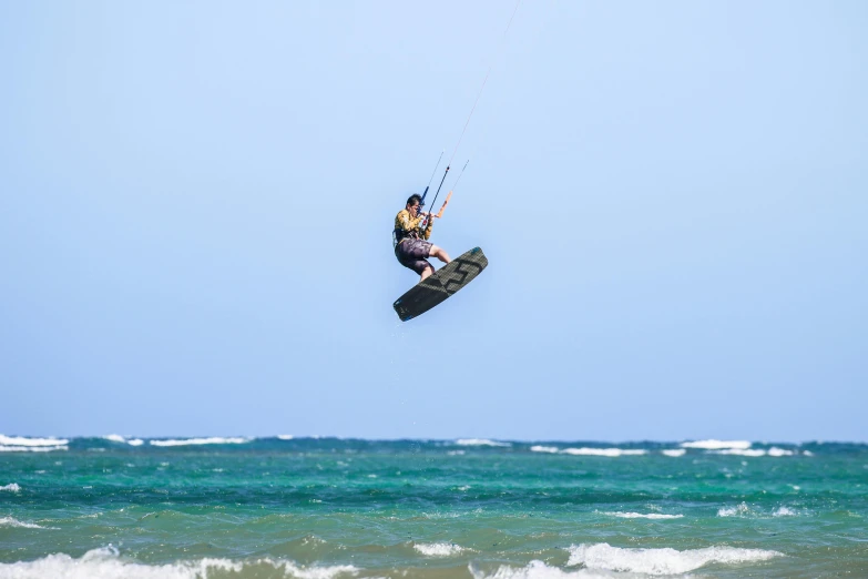 a person that is riding a surfboard in the water