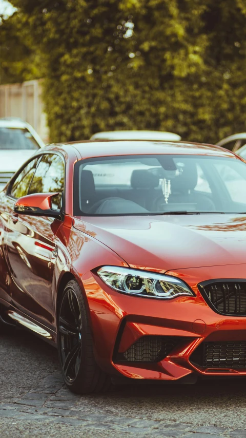 a bmw bmw car parked on a street