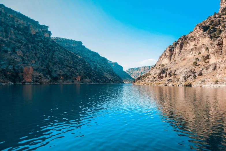 a lake and a cliff near by