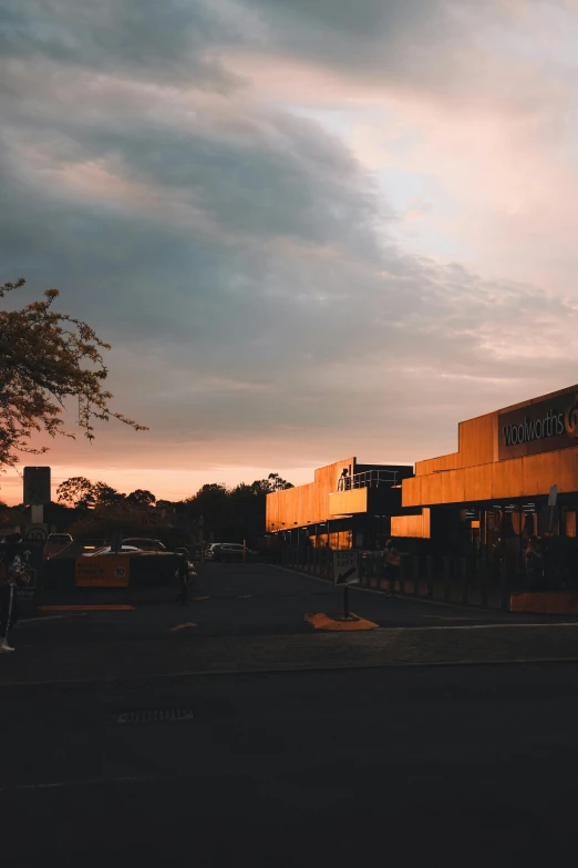 a building on the side of a street during dusk