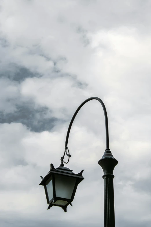 street lamp on cloudy day in a european city
