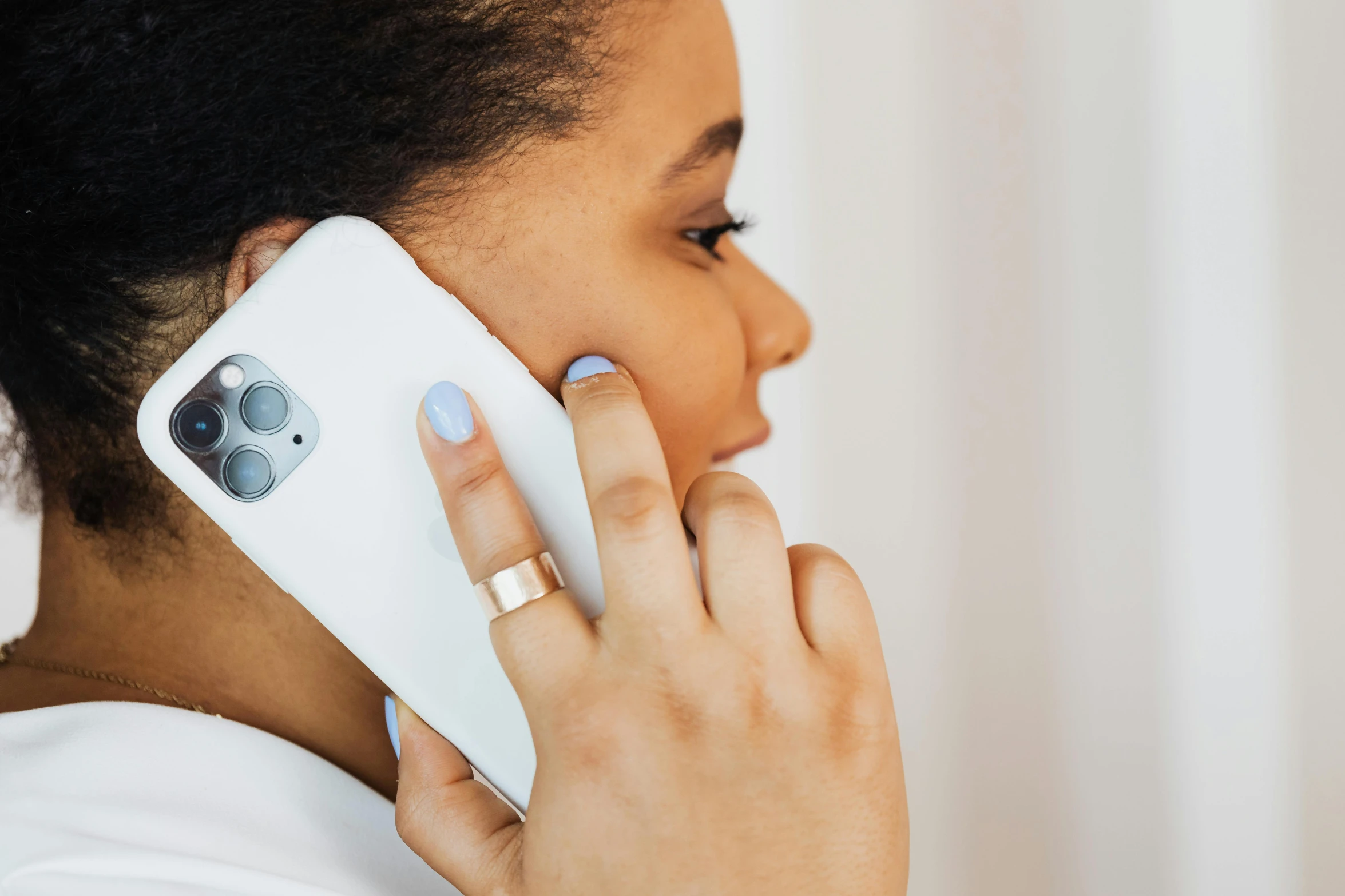 a close up of a person holding a cell phone