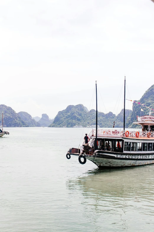 an island boat in the middle of water