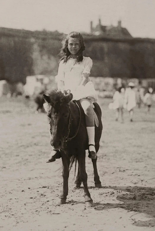 a woman riding on the back of a brown horse