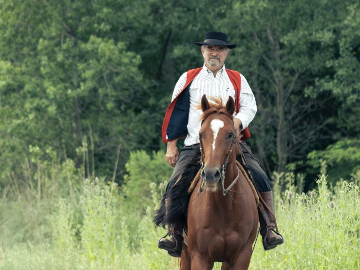 a man is on a horse on the street