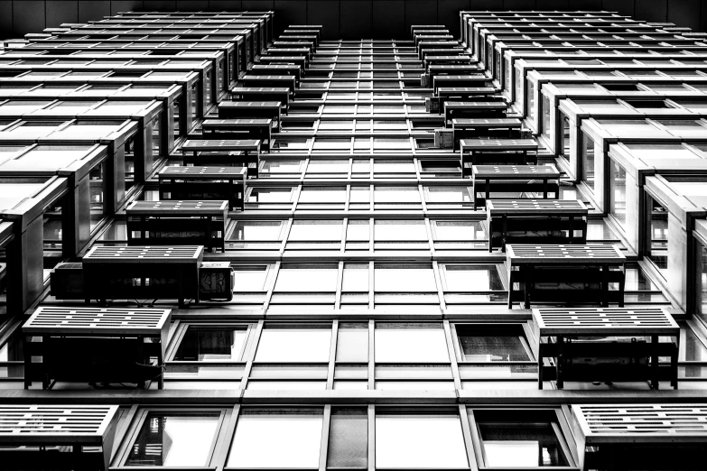a black and white po of many building windows