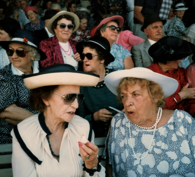 a group of people in hats at a competition