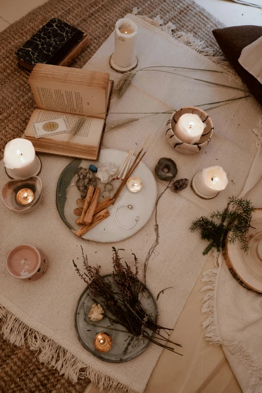 an image of a place setting with candles on it