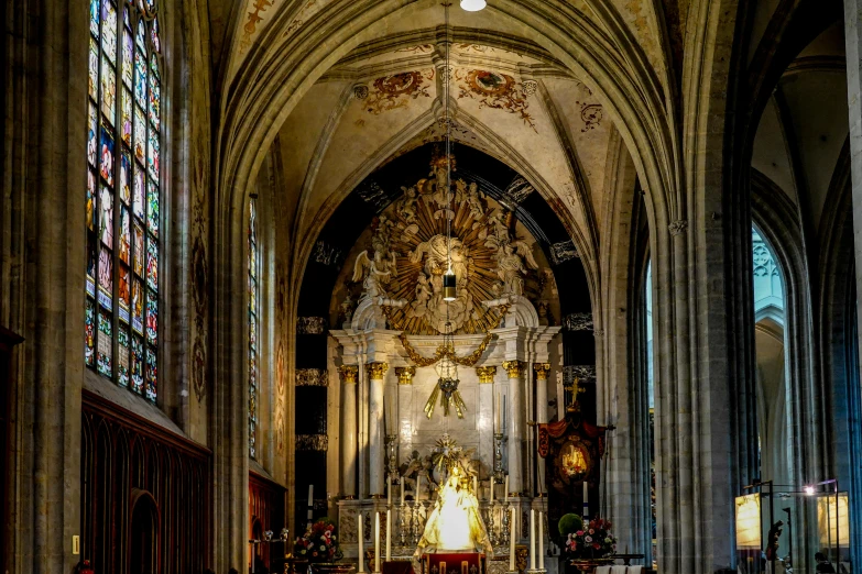 a church that has many windows and light fixtures