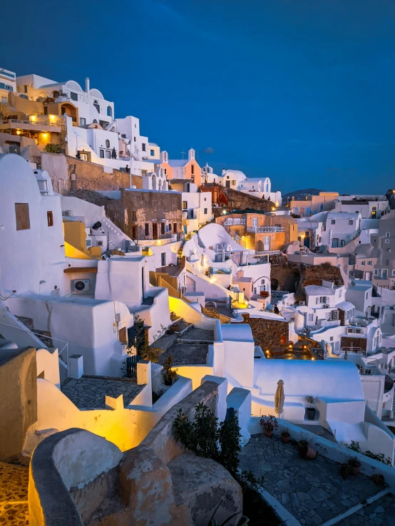 an overview of a city with buildings lit up