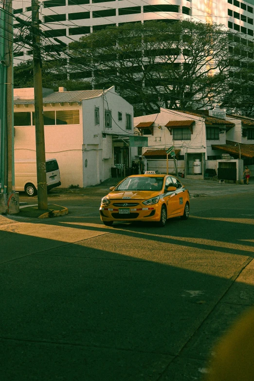 a car that is parked by a building