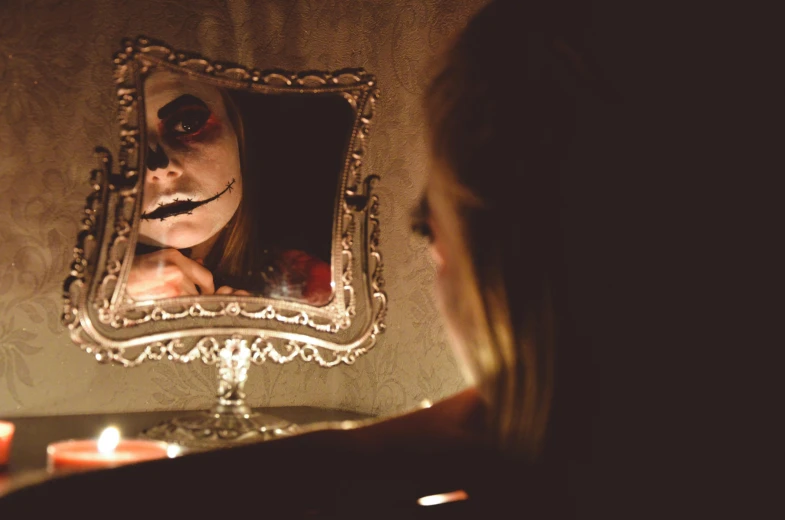 a woman in the reflection of a mirror with a creepy face