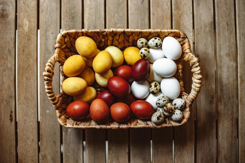 some eggs are sitting in a wicker basket