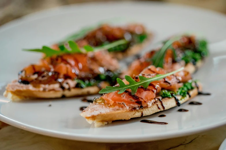 a white plate topped with an array of pieces of food