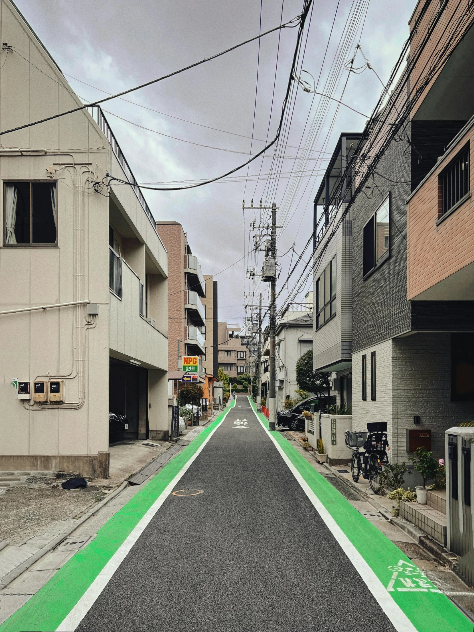 an empty road is pictured on this urban street