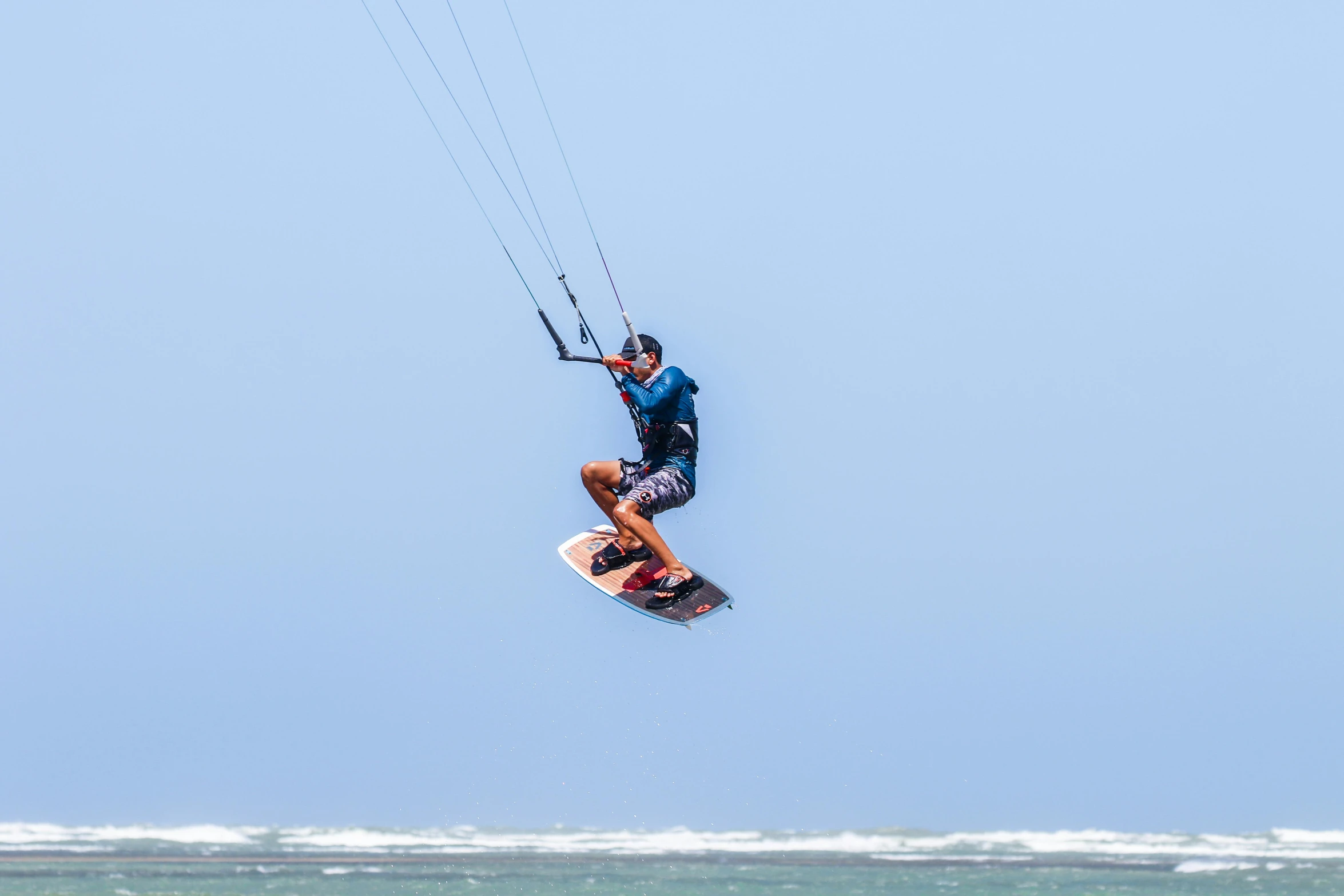 a person riding on a board and doing a flip